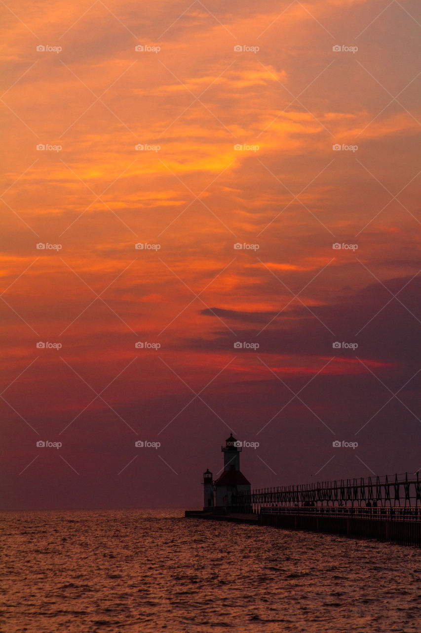 lighthouse at dusk. Benton harbor lighthouse at dusk