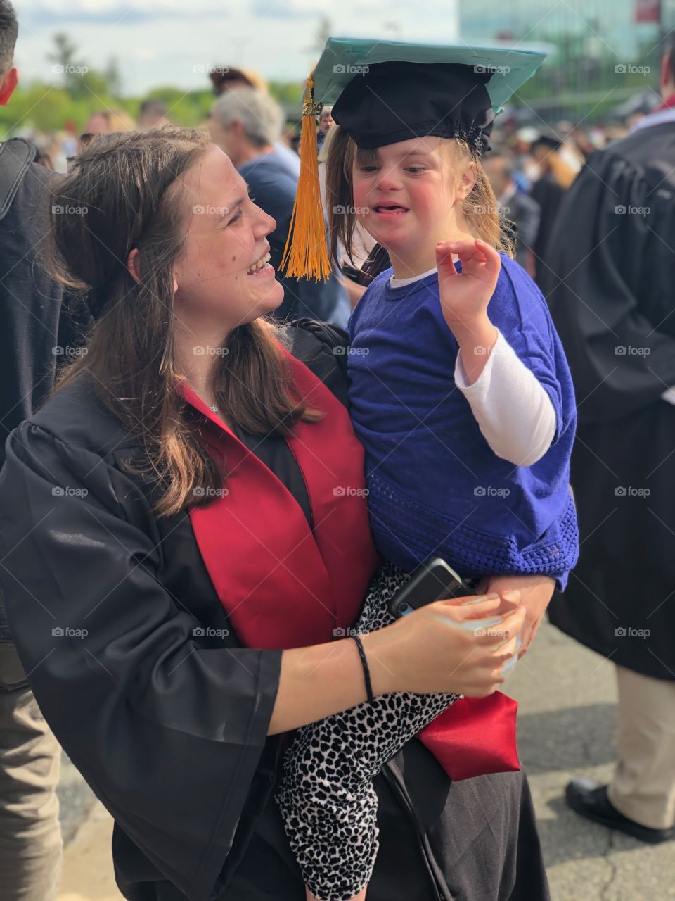 Sisters, graduation, Down syndrome 