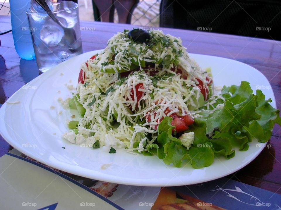 Tasty Mediterranean salad with vegetables and cheese 