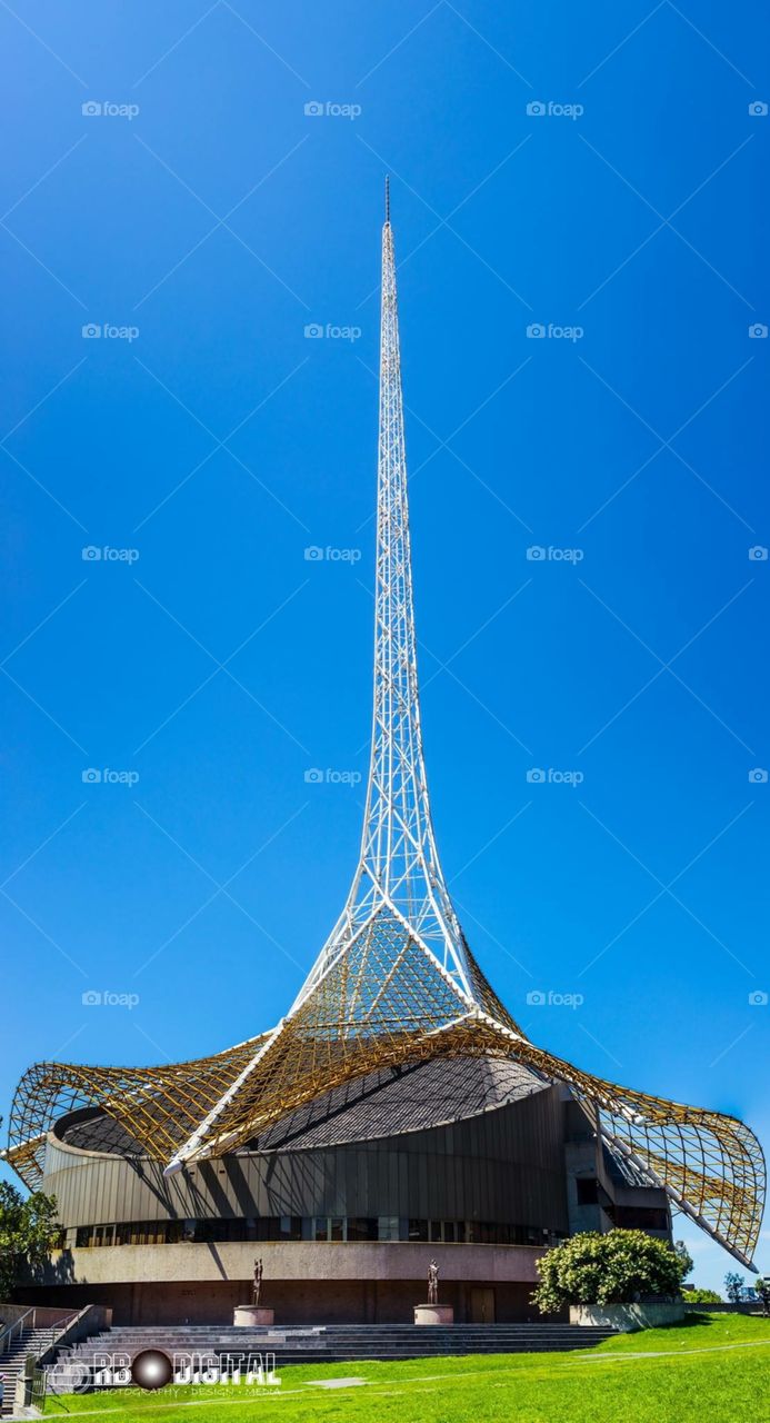 Melbourne's Art Centre Spire on a beautiful sunny day. This image is a horizontal panorama I stitched together. Beautiful clear blue sky.