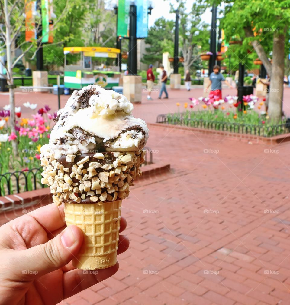 Hand holding ice cream cone