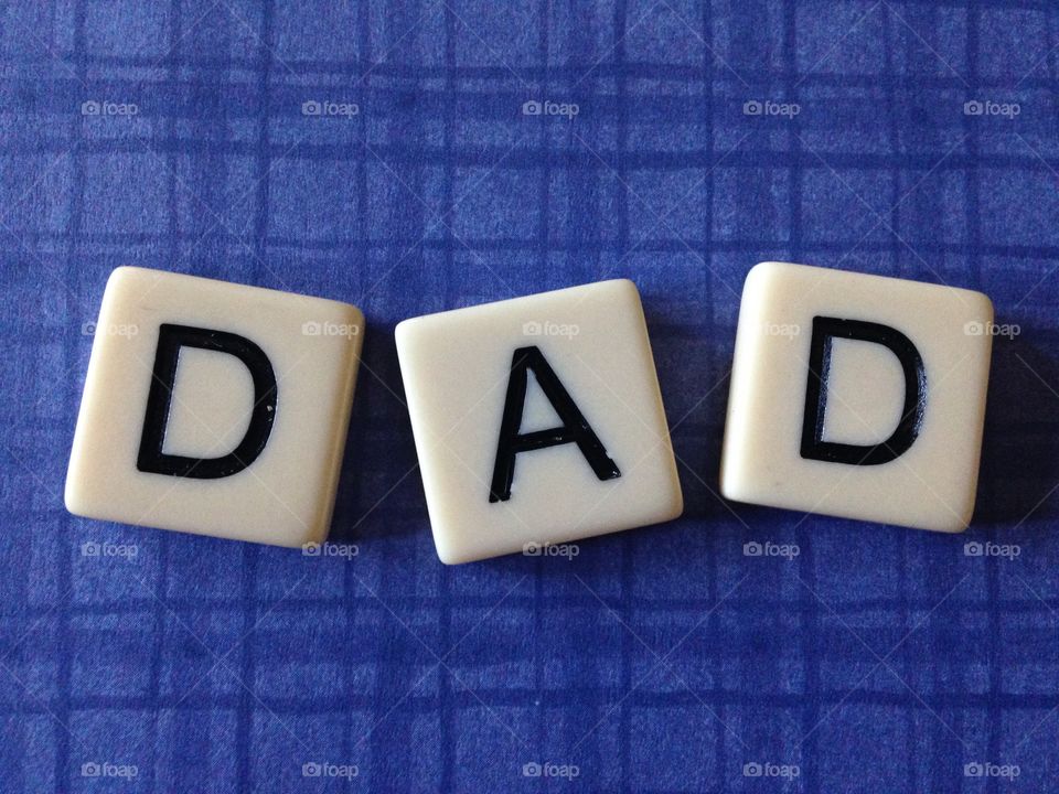 Dad. Dad made with letter tiles