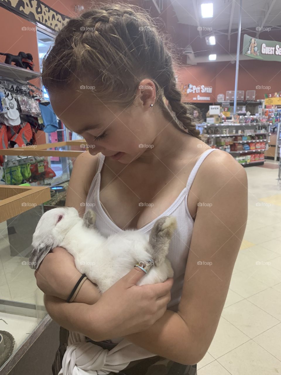 My daughter holding a bunny like a baby 