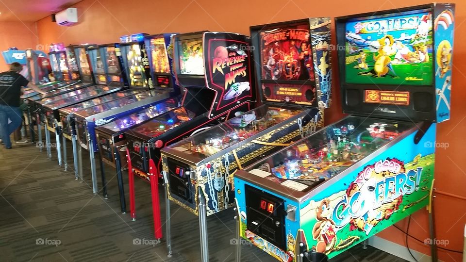 classic pinball arcade machines in a row