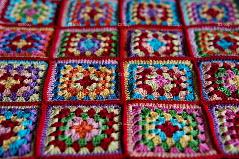 Hand made crocheted colored granny squares