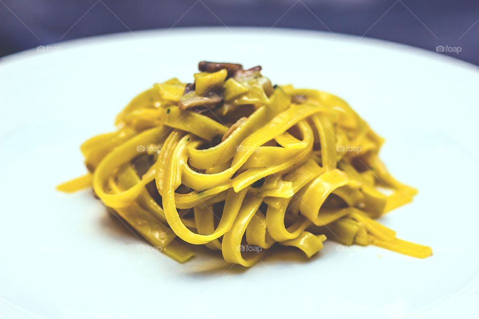 Pasta with champignons and porcini mushrooms