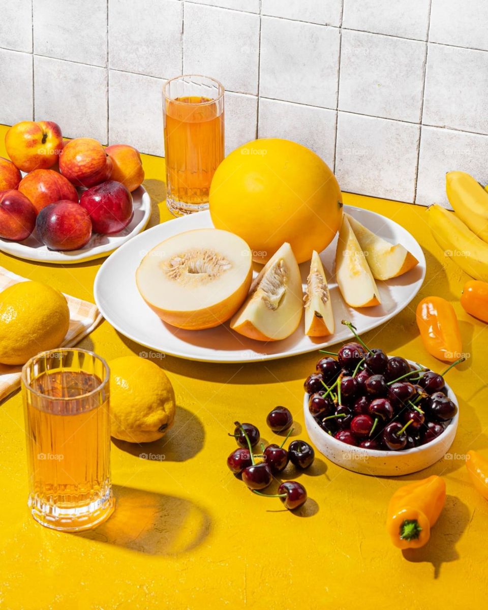 fruit variety on yellow background