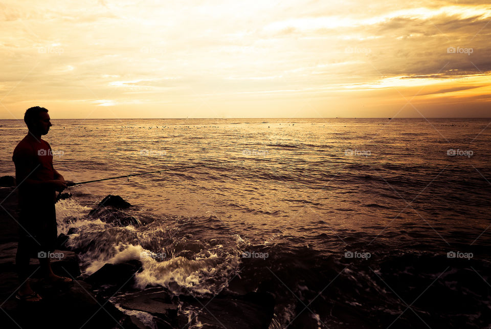 Summertime. Fishing at Sunset Beach. Cape May, NJ