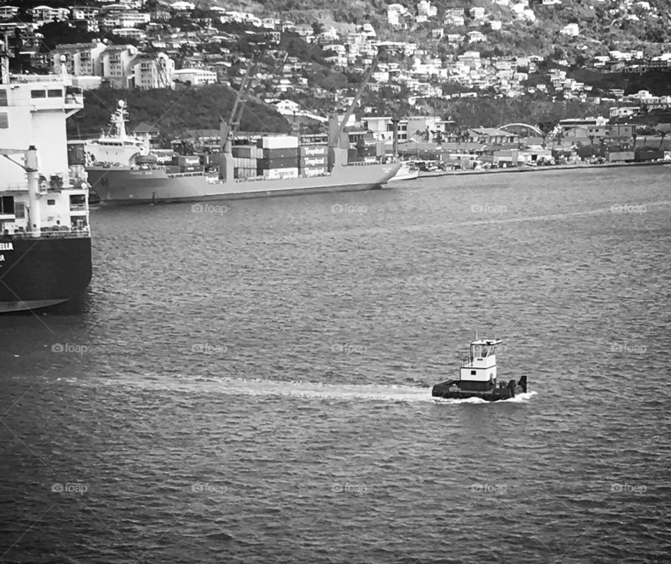 The worlds smallest boat - so cute as it chugged across the harbor.  Black and white brings out more detail. 