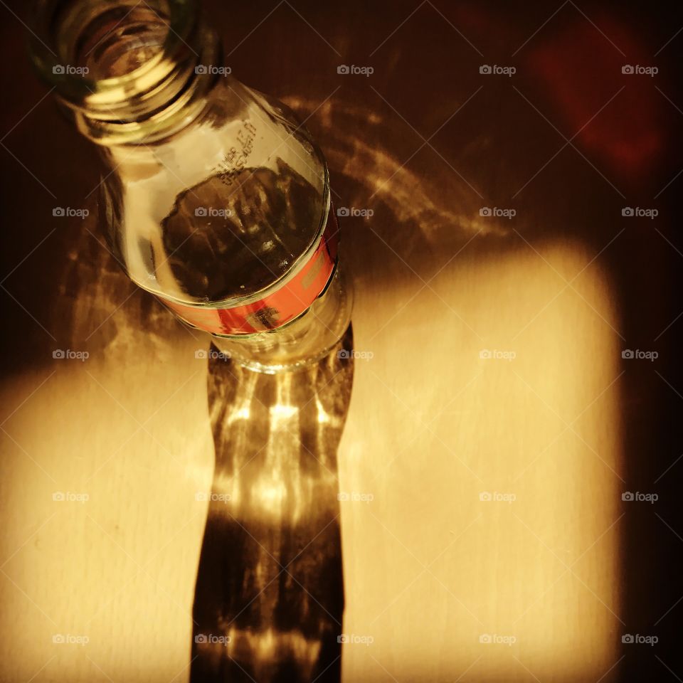 Coke bottle sunlight reflections