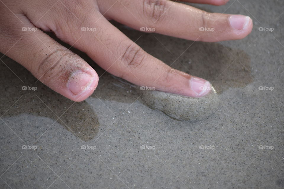 touching sand