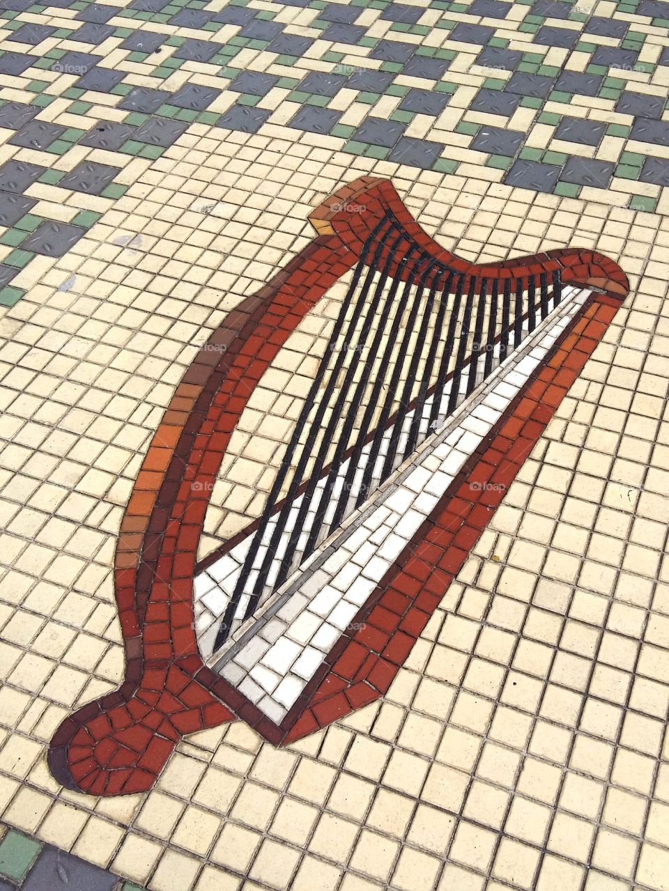 Irish harp mosaic on a floor in Dublin.