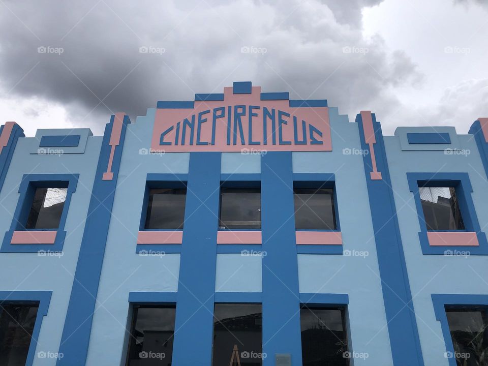 Building facade painted in candy colors pink and blue