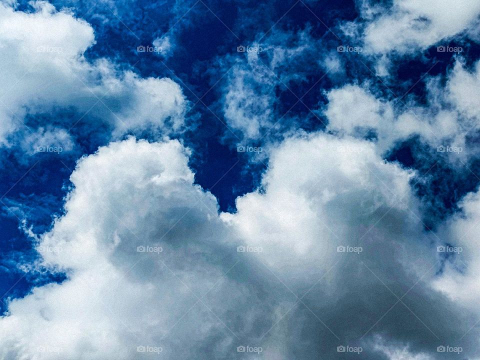 I want to show white clouds and blue sky in this photo.  The sky looks very beautiful with clouds and blue sky.