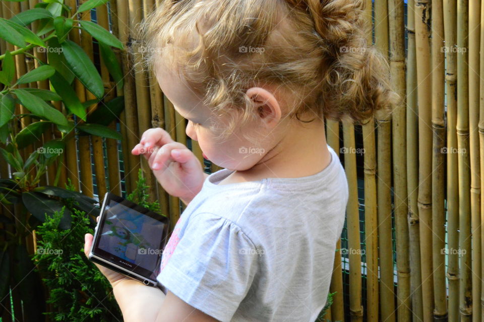 Kid with smartphone