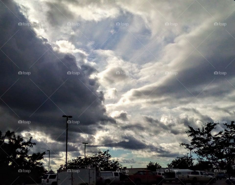 clouds above a parking lot