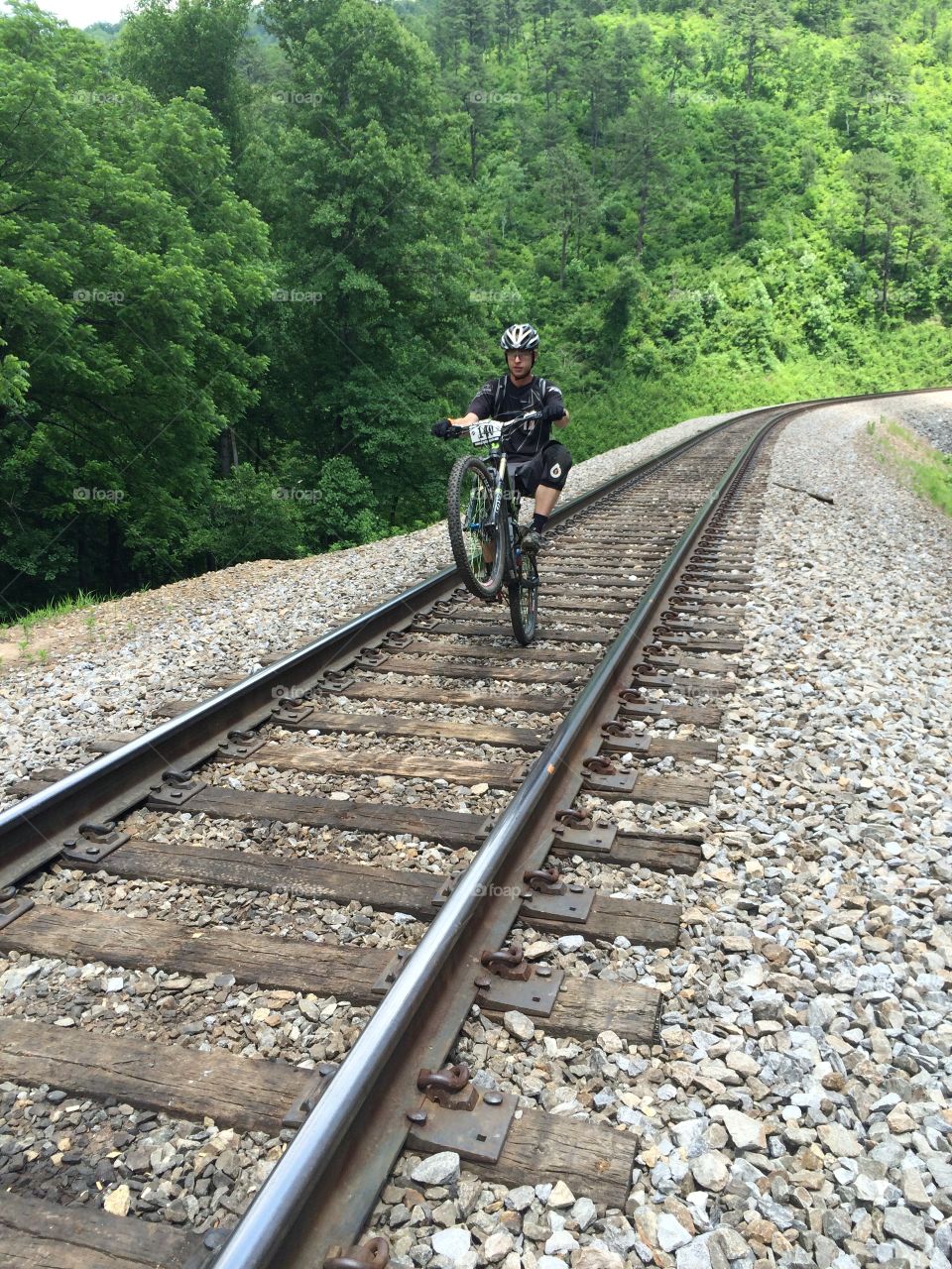 Riding on rails . Mid race wheelie on the tracks 