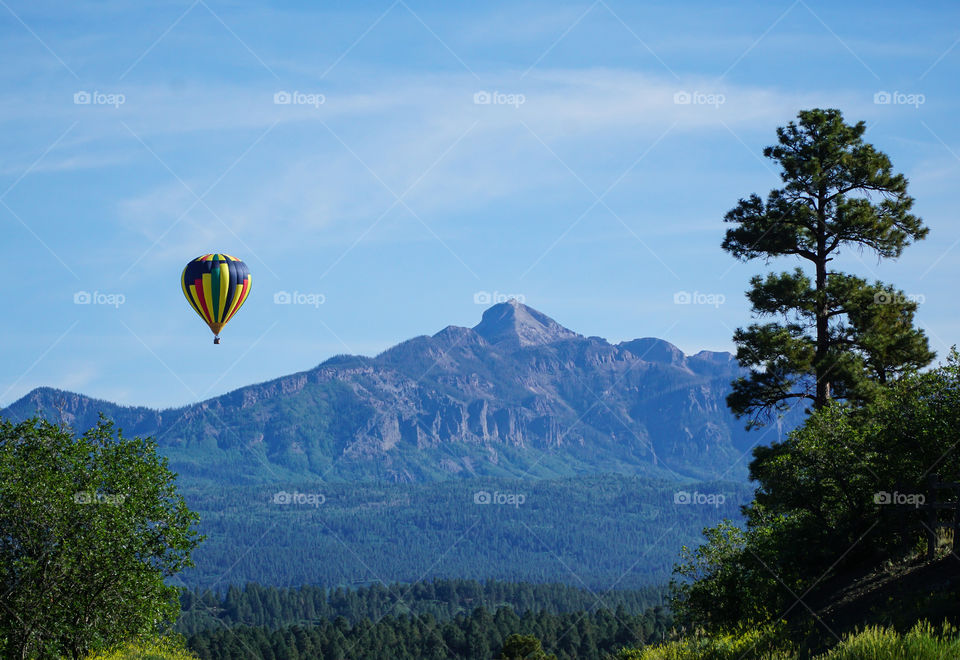 Balloon flying over the mountains