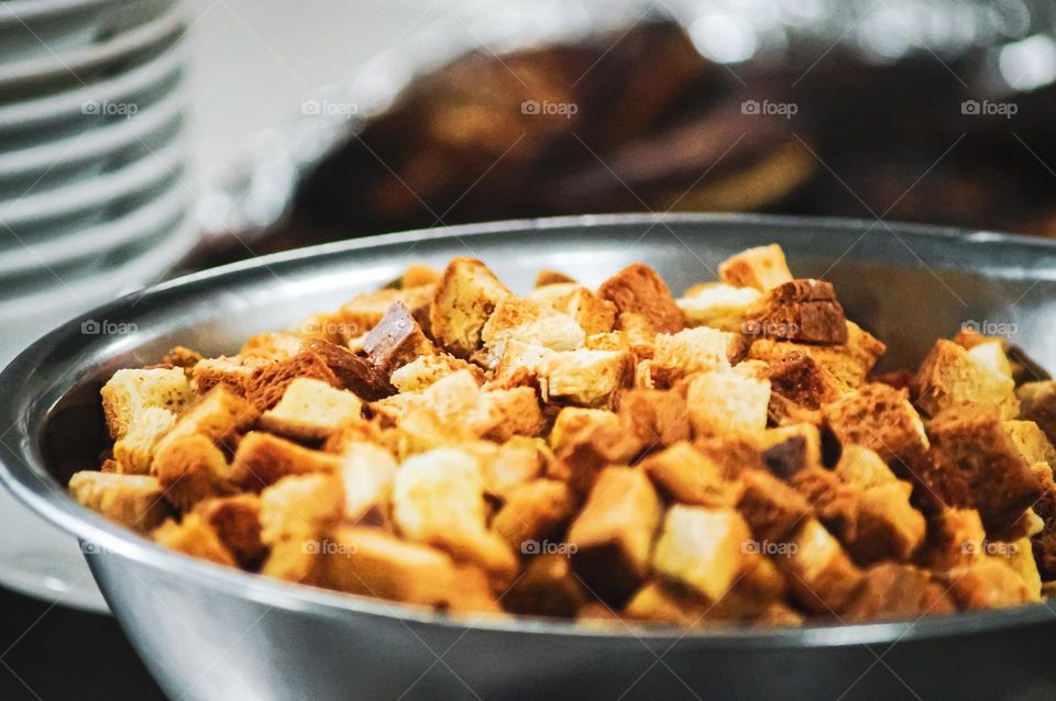 Bowl with fragrant crackers made from white bread