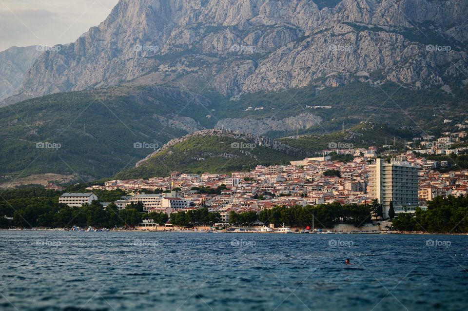 We are so small in this big world. A view on the mountains from the beach in Makarska, Croatia. ❤️