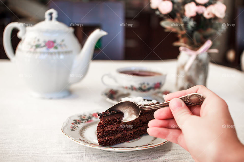 a cup of tea with cake