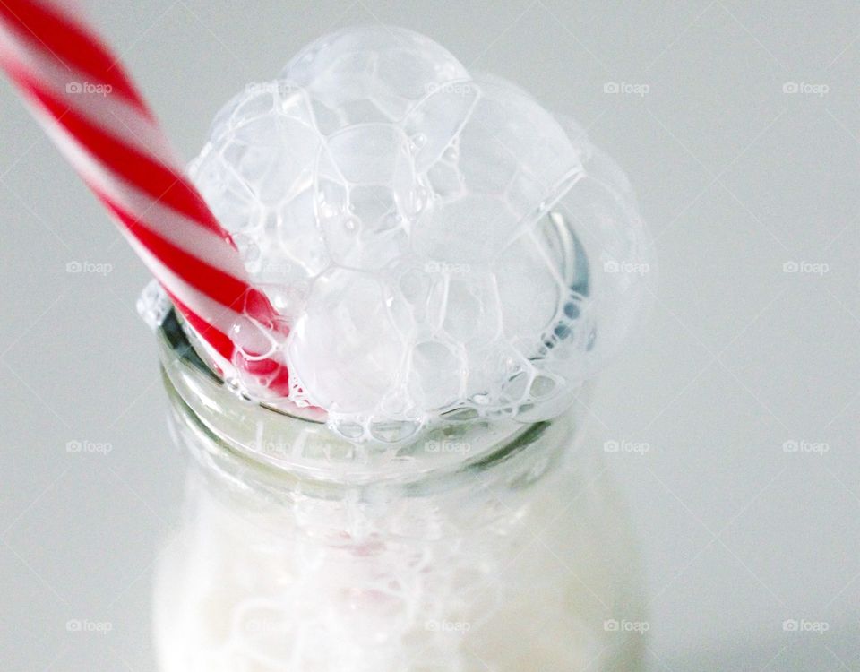Close-up of bubble on milk bottle