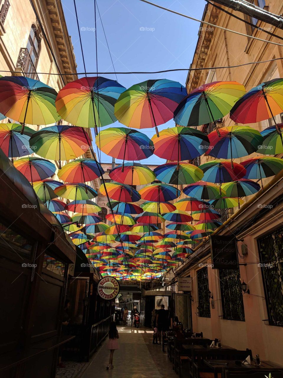 rainbow umbrellas in the streets of Romania