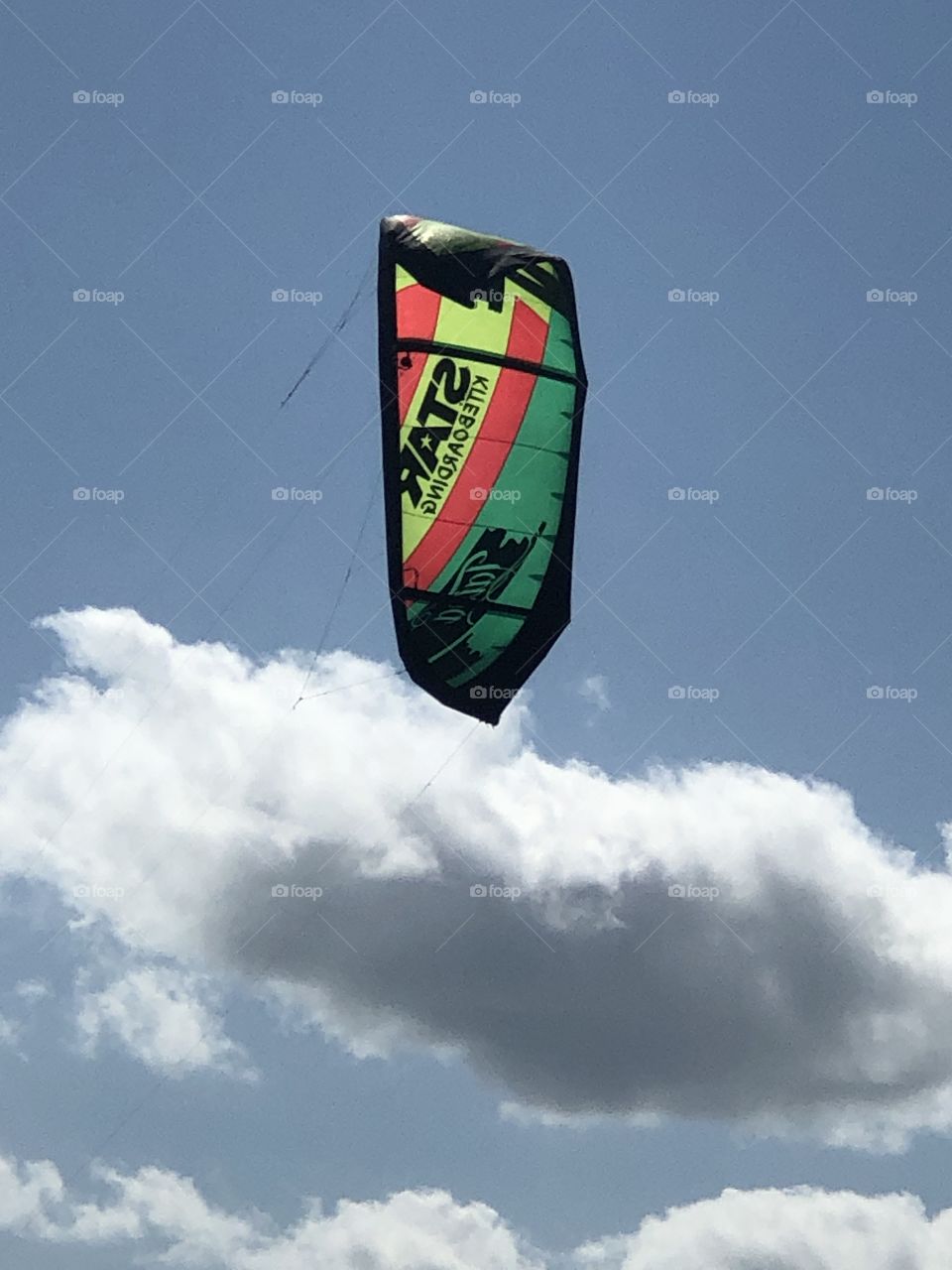 Kite in the clouds 
