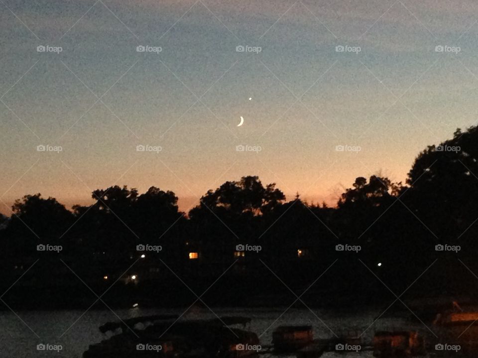 Crescent moon. Crescent moon after summer storm 