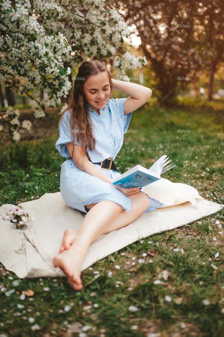 Beautiful woman on the picnic in the park 