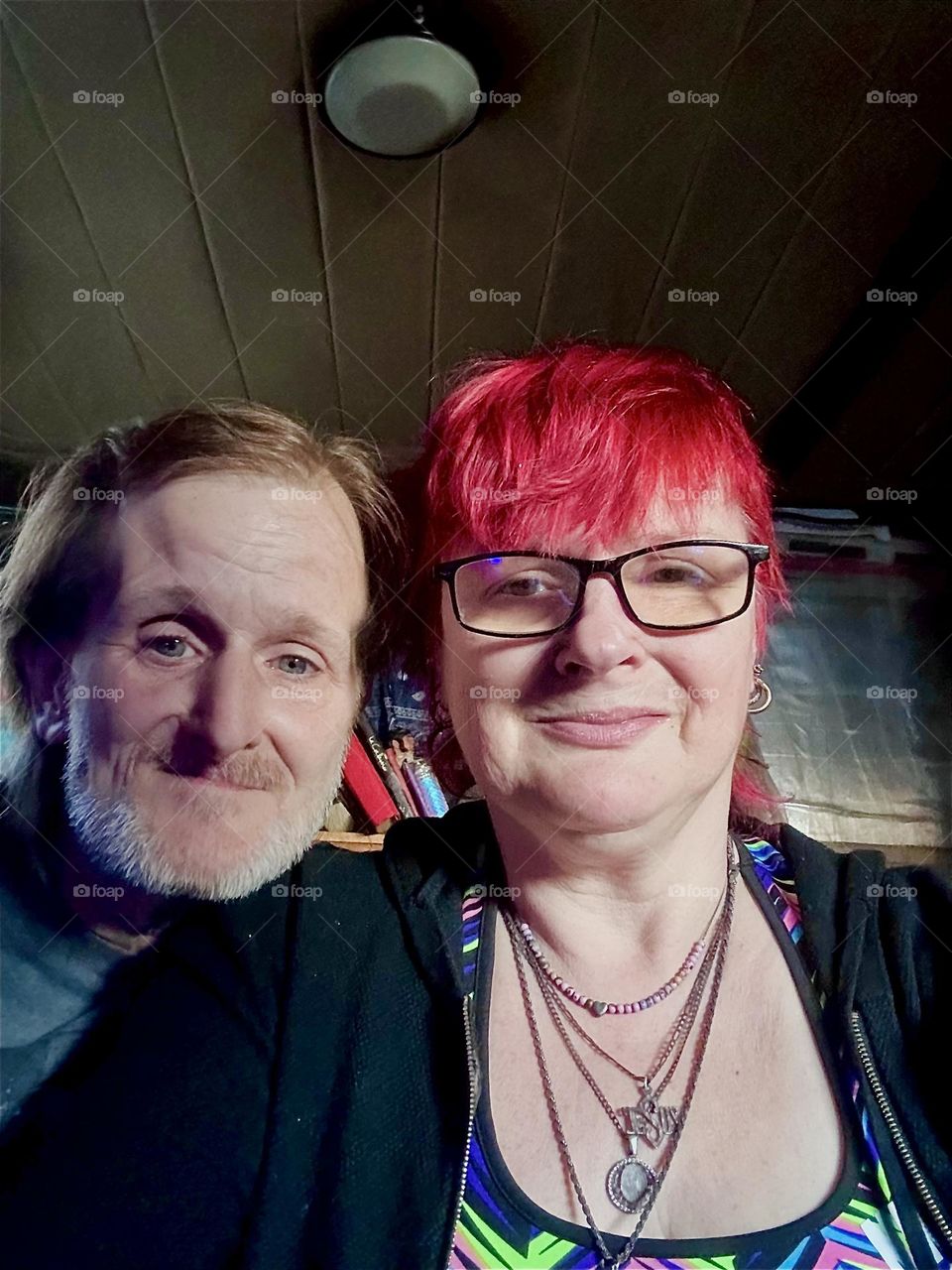 Advancing in years but still happy together, this is me, “Petra Schiller” a.k.a. “Maxine Firefox” and partner “Timothy Trespas” aboard “Salvation”, a “28 ft 1969 Luhrs” cabin cruiser at “Newtown Creek” in LIC, Queens. 2024. Hypnotic Productions