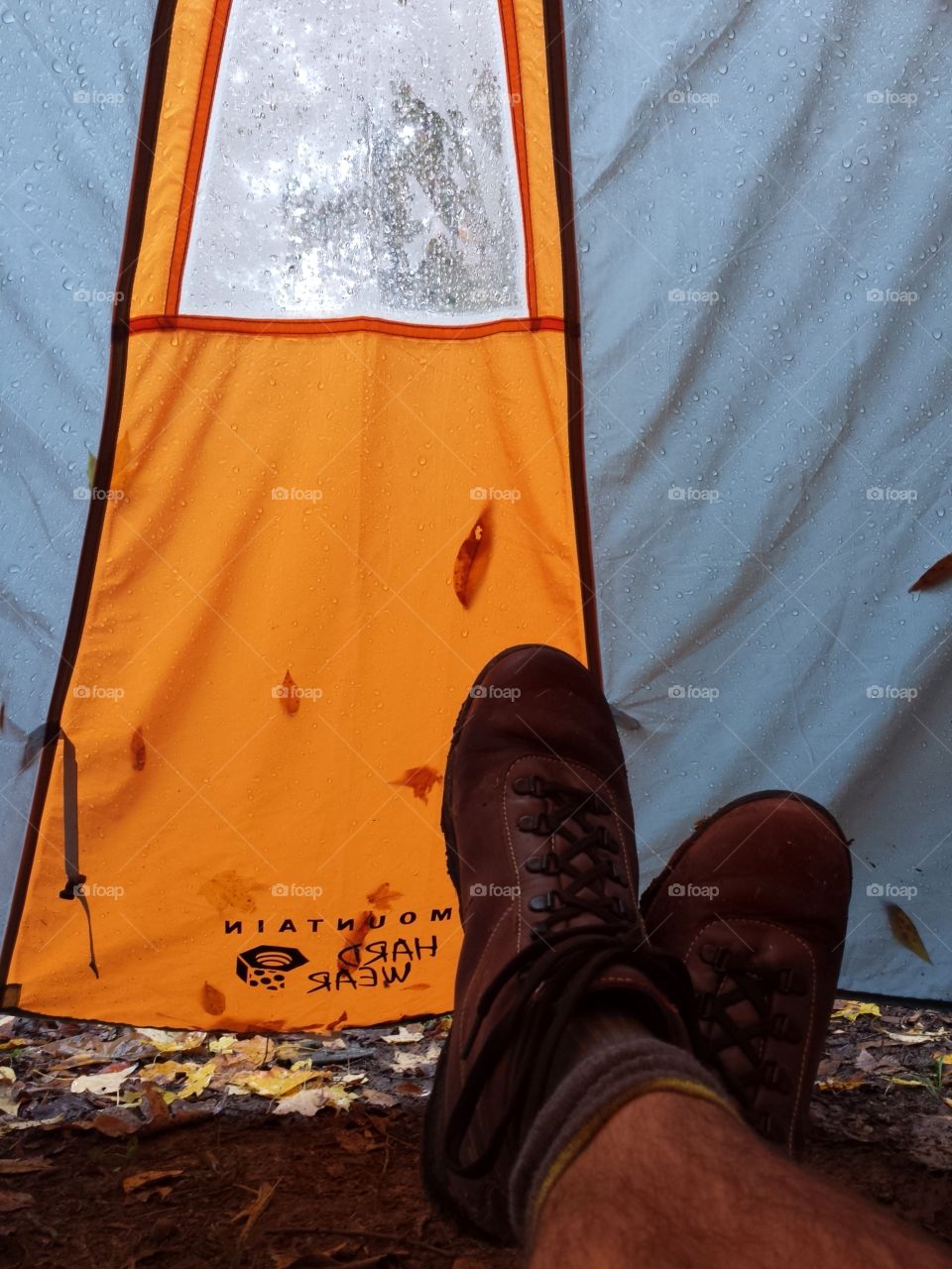 in the tent avoiding rain