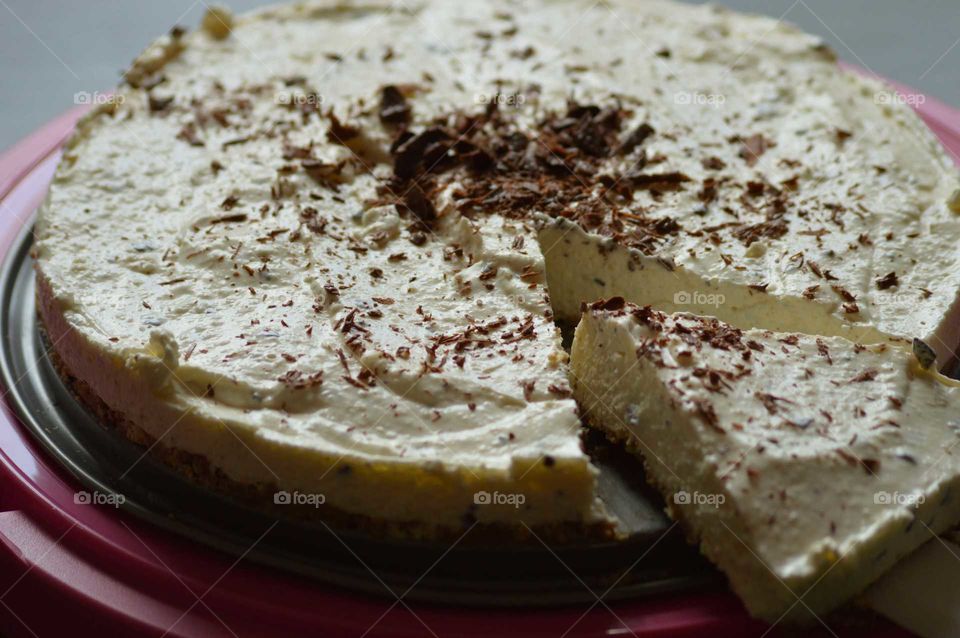 homemade cold cheesecake with grated chocolate