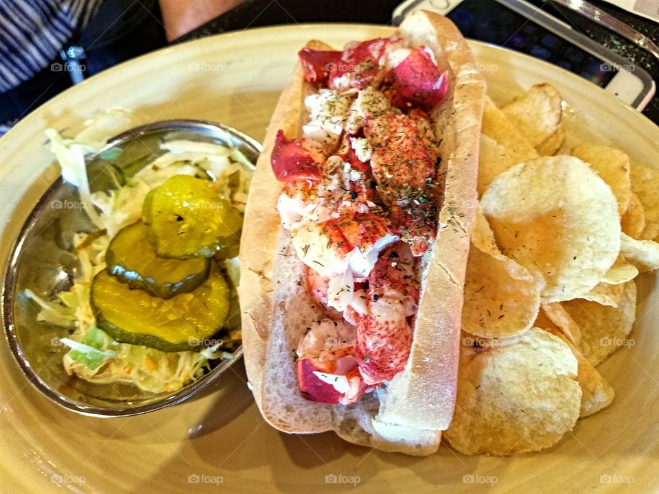 Lobster roll with coleslaw and chips!