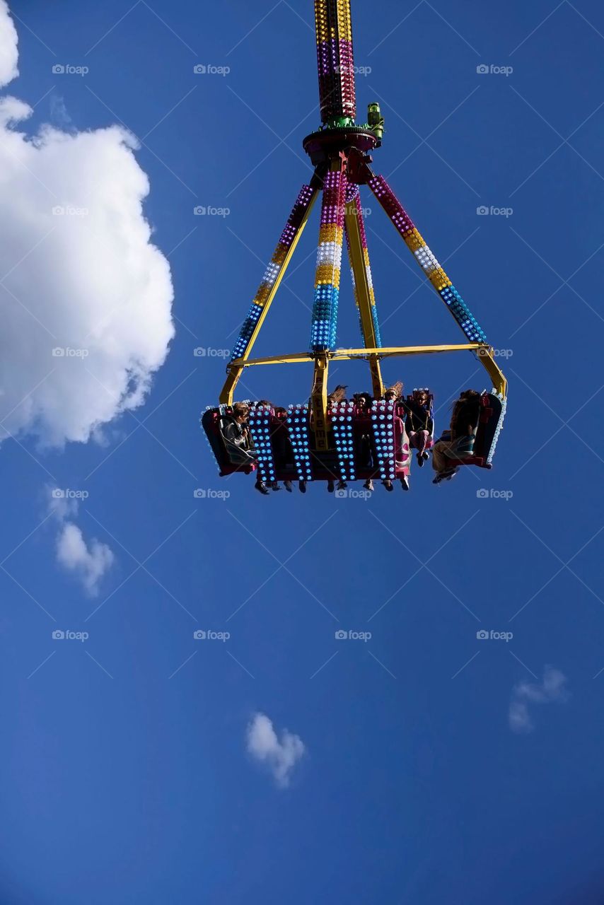 Air attraction against the blue sky. Entertaining attractions in Zielona Gora in Poland at the wine picking festival.