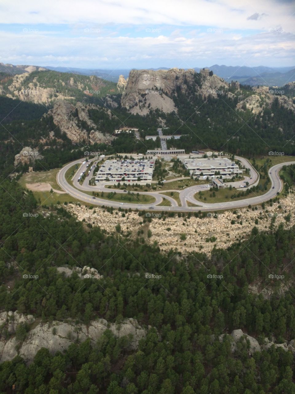 Mt. Rushmore National Memorial, Keystone, South Dakota, taken from a helicopter over the Black Hills