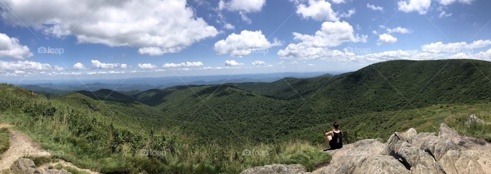 Humans seem tiny in this image from atop Tennent Mountain in the Blue Ridge Mountains.  