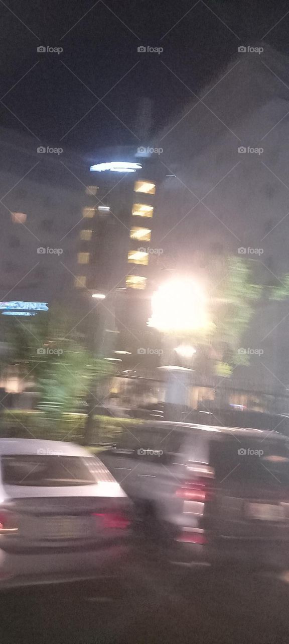 Twinkling windows , the beauty of evening light. Bask in the beauty of evening light with the view of light twinkling from these windows at night