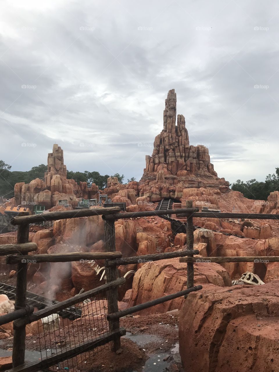 Thunder Mountain ride at Disney with the dark sky in the background. 