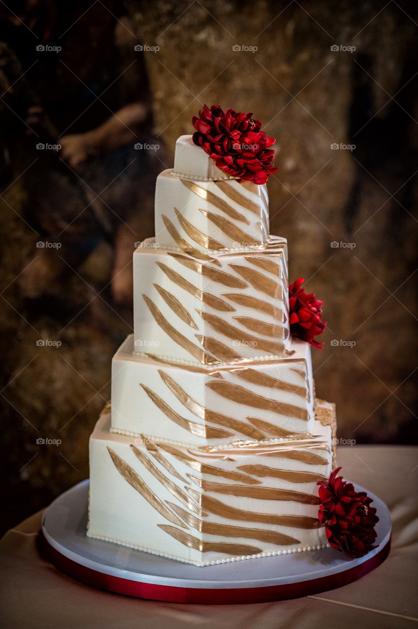 Gold decorated wedding cake