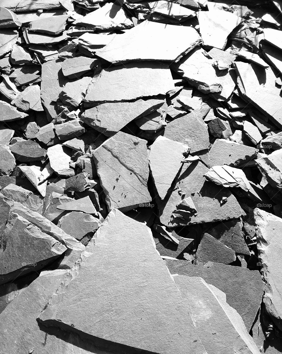 Grey stone chippings basking in winter sunlight