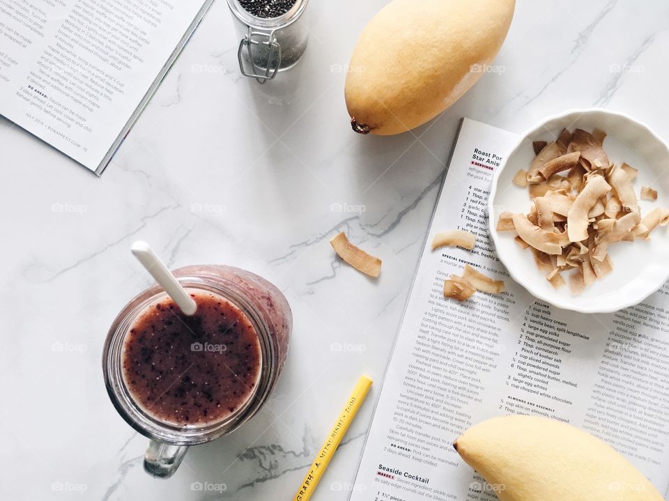 Fresh Fruit Smoothie : Mango blueberry smoothie with coconut chips.