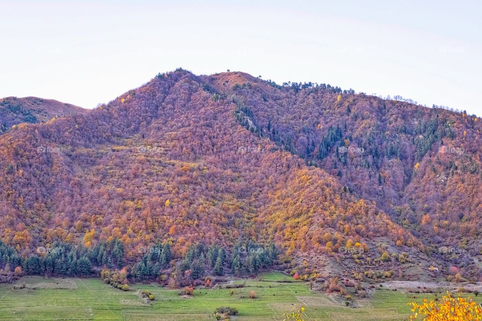 Colorful autumn scene of mountain scape along the way in Georgia 