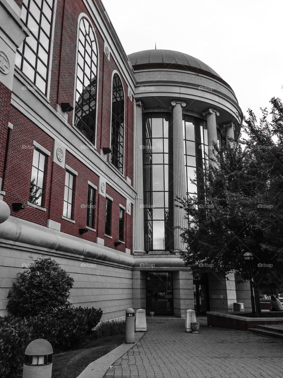 Brick city building with glass. Townhall columns and glass