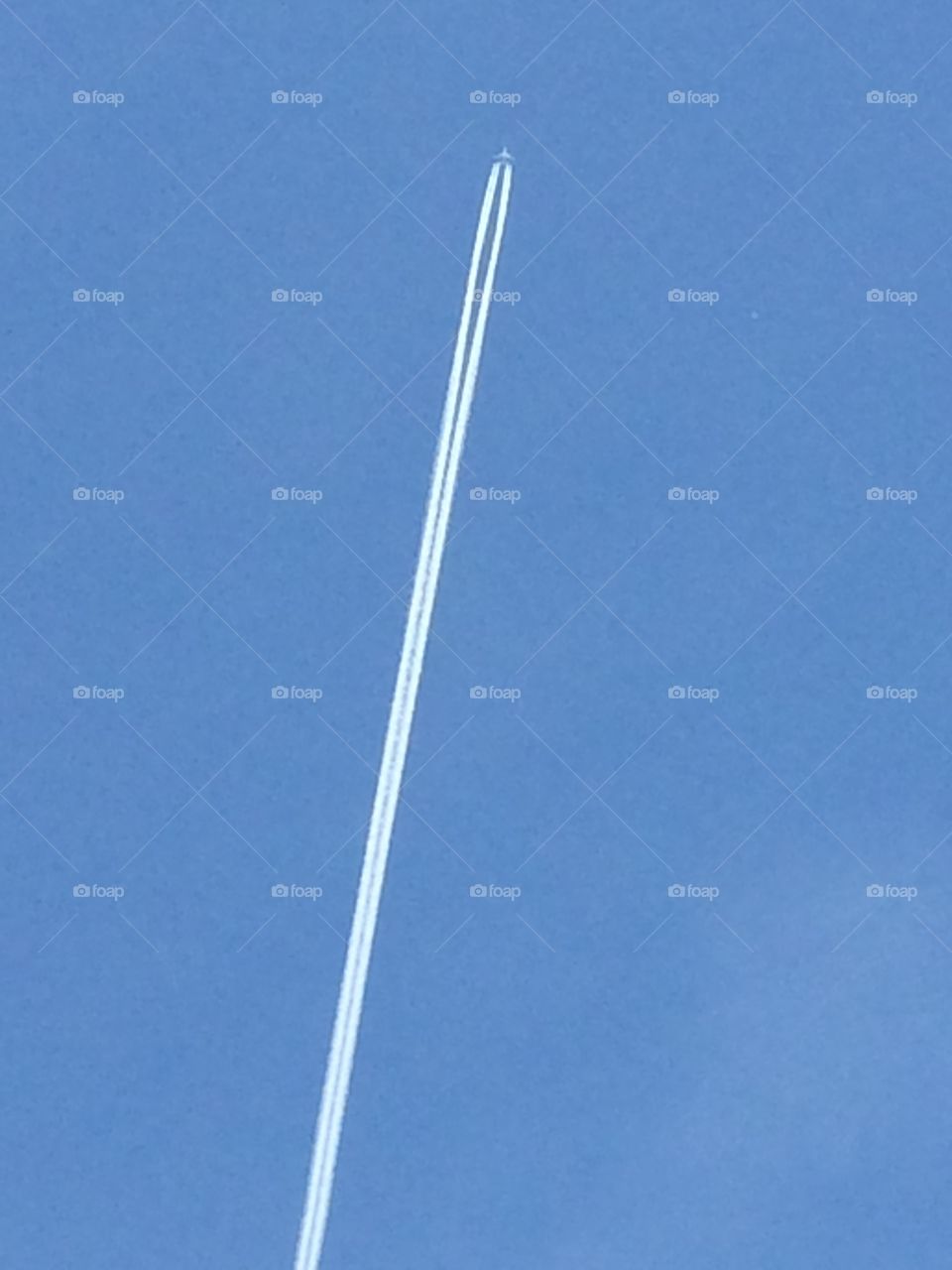 Plane in a blue sky 