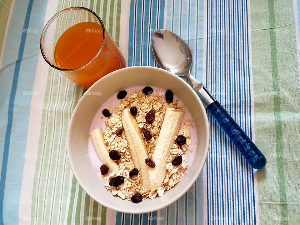 high angle view of breakfast with juice