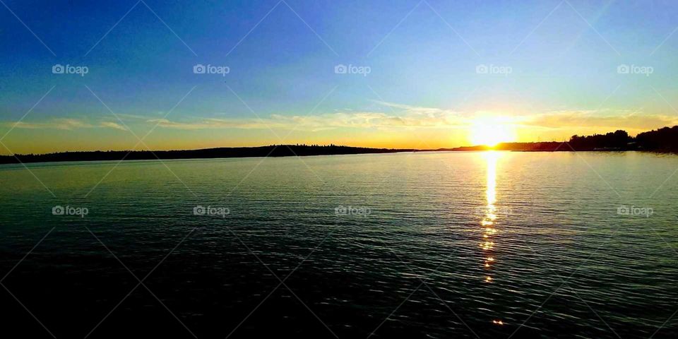 a lake at sunset
