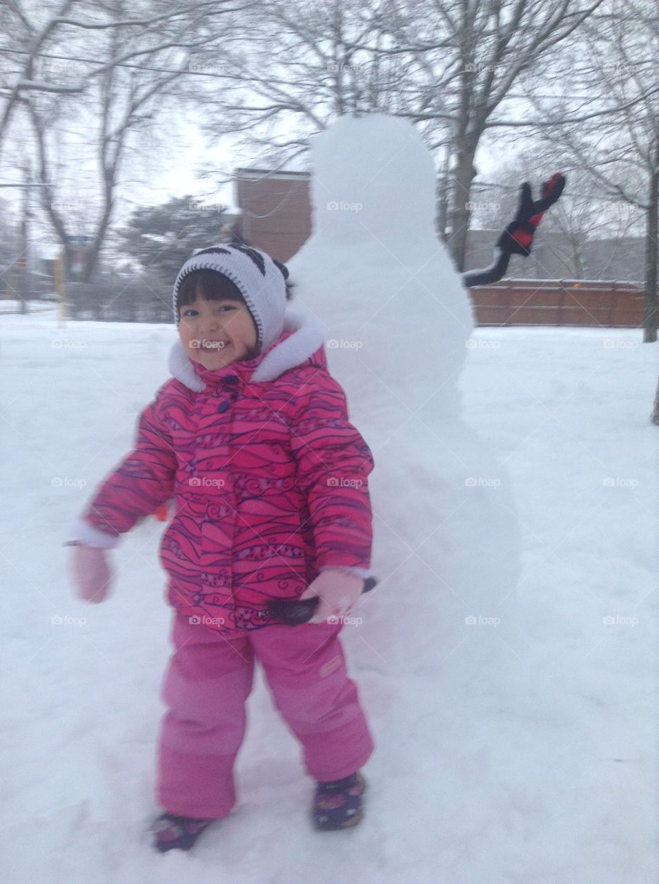 Happy laughing girl in warm jacket