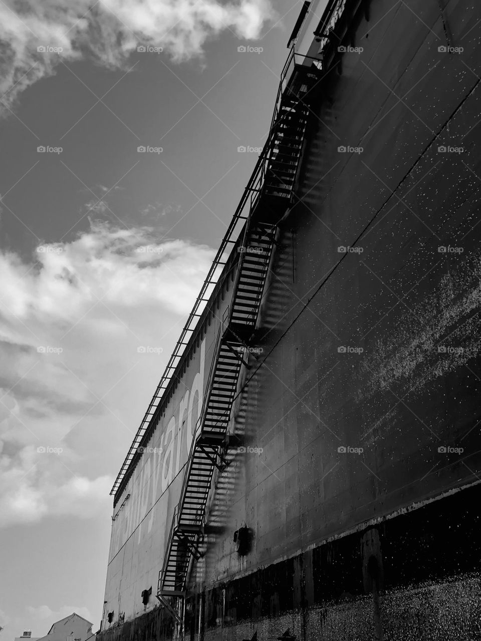 Fishing trip. Galveston ship channel. Black and white. This steel staircase made us feel very small!