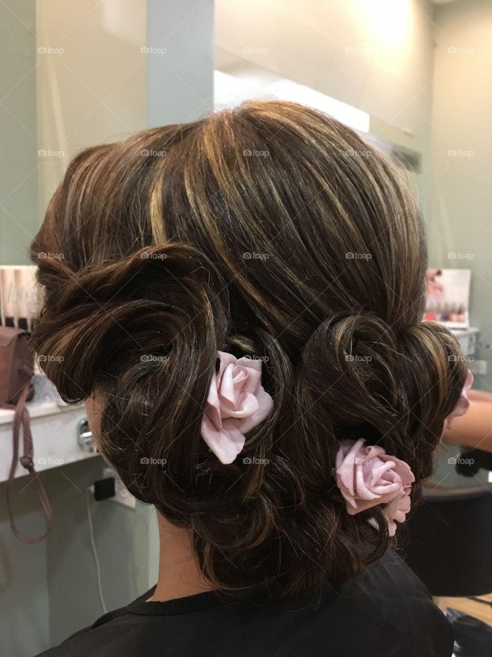 Beautiful Hairstyle with pink flowers 